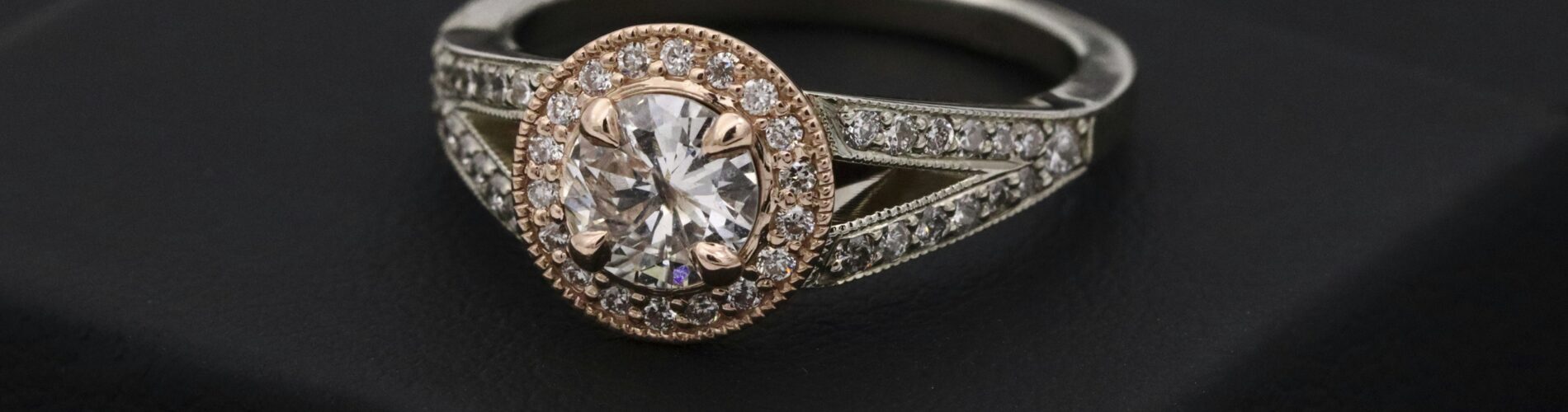 a ring on a black surface